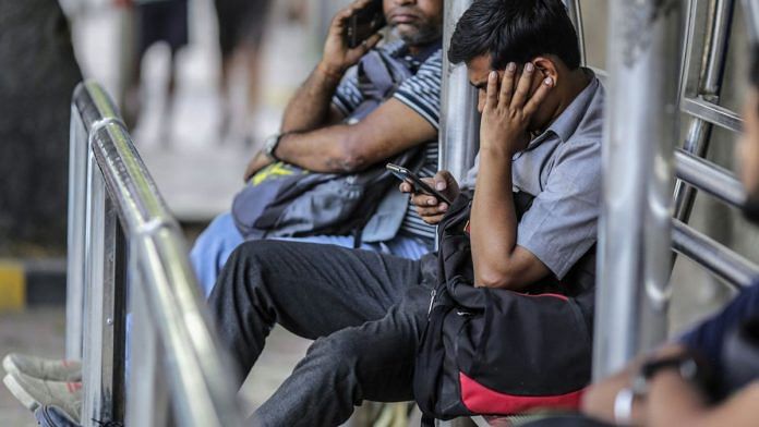 People browse their mobile phones in Mumbai (representational image)| Photographer: Dhiraj Singh | Bloomberg