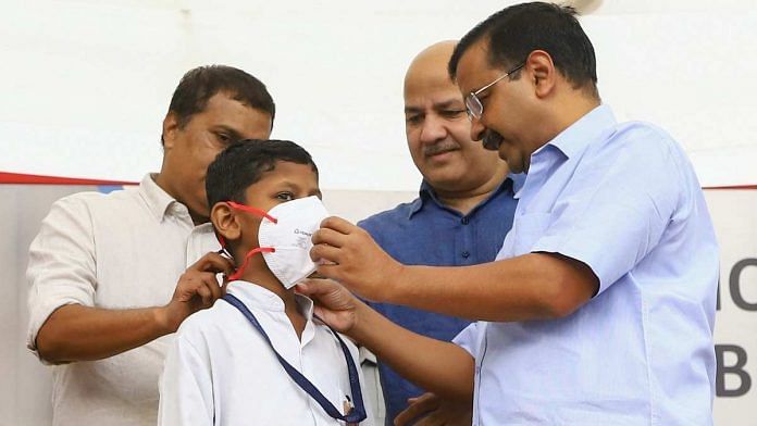 Chief Minister Arvind Kejriwal distributes masks in schools | PTI