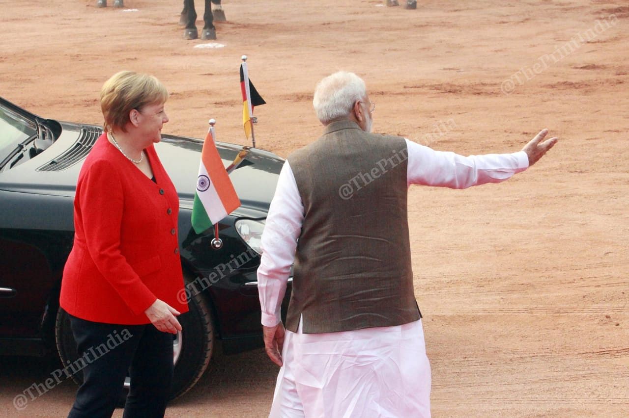 Prime Minister Narendra Modi with German Chancellor Angela Merkel. This is the fifth meeting between the two leaders this year | Photo: Praveen Jain | ThePrint