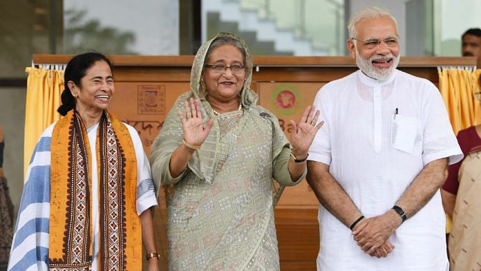 File photo | Narendra Modi, Sheikh Hasina and Mamata Banerjee at inauguration of Bangladesh Bhavan, at Santiniketan, May 25, 2018 | PIB