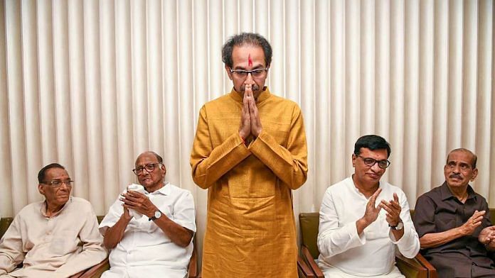 Shiv Sena President Uddhav Thackeray gestures after he was chosen as the nominee for Maharashtra CM post by Shiv Sena-NCP-Congress alliance, during a meeting in Mumbai on 26 November | PTI Photo