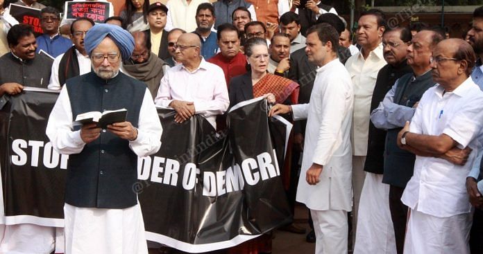 Former PM Manmohan Singh along with Congress leaders Sonia and Rahul Gandhi during a protest outside Parliament in New Delhi | Photo: Praveen Jain | ThePrint