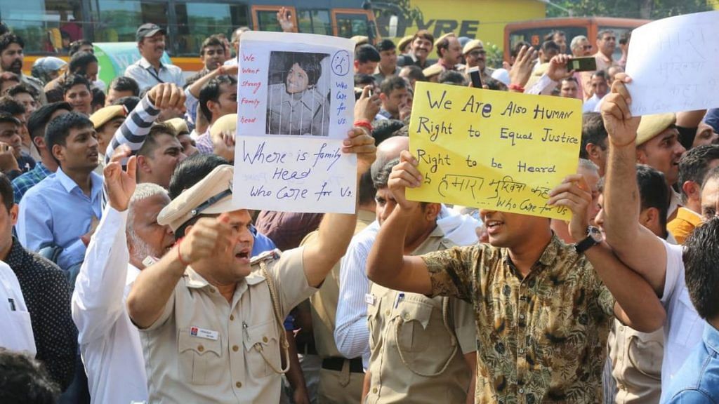 File photo of police personnel holding a protest outside the Police Headquarters (PHQ), against the clash that broke out between Delhi Police personnel and lawyers at Tis Hazari Court | Photo: Suraj Singh Bisht | ThePrint.
