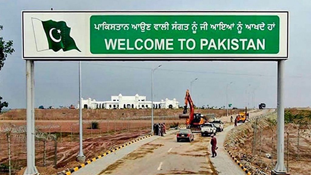A sign board reads, ' Welcome to Pakistan', against the backdrop of Gurdwara Kartarpur Sahib in Pakistan. | File Photo | PTI