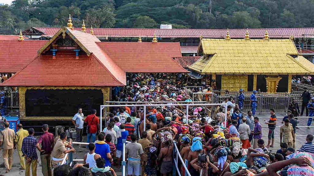 Devotees arrive at the Lord Ayyappa temple for long Mandala-Makaravillakku pilgrimage in Sabarimala