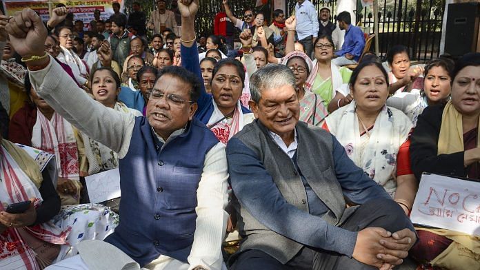 Former Uttarkhand chief minister and Congress in-charge of Assam Harish Rawat along with President of Assam Pradesh Congress Committee (APCC) Ripon Bora stage a protest against the Citizenship Amendment Act (CAA), in Guwahati, Thursday, 19 December, 2019. | PTI