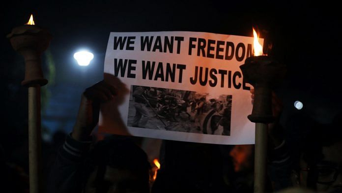 JNU students hold a torchlight march to protest against the CAA and NRC on 18 December