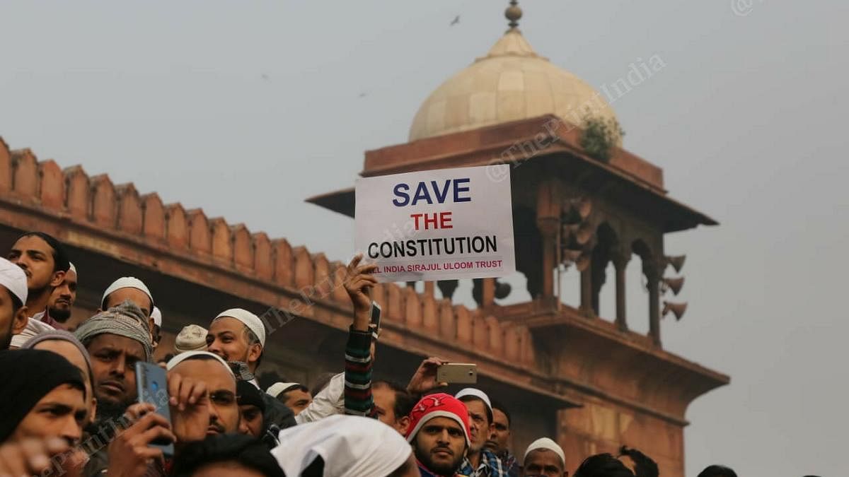 Jama Masjid protest A man holds up a placard that reads 'Save the Constitution' at protest at Jama Masjid in New Delhi on 20 December 2019 | Suraj Singh Bisht | ThePrint Photo
