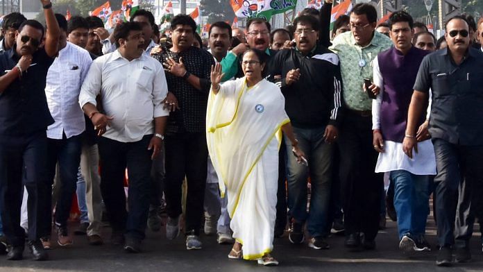 Bengal CM Mamata Banerjee leads a protest rally against the new citizenship law in Kolkata Wednesday