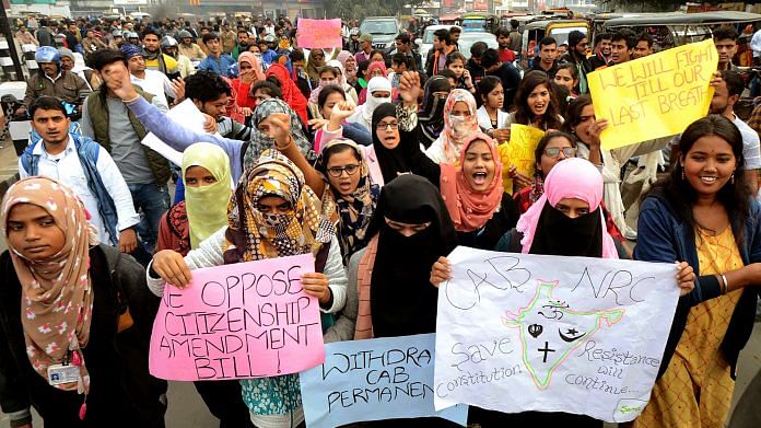 Students of Patna University hold placards during a protest against Citizenship Amendment Act 2019, in Patna