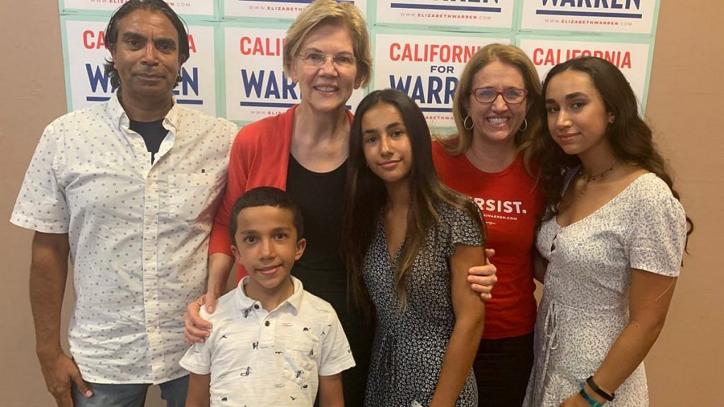 Sushil Tyagi (far-left) with Democrat Senator Elizabeth Warren. Warren's daughter Amelia is also seen, along with her and Sushil's three children