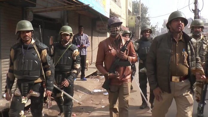 Police personnel patrol on the streets during the tight security setup after the protest against Citizenship Amendment Act 2019 turned into violence at Yateem Khana Police Station area on Saturday, in Kanpur on Sunday. | ANI