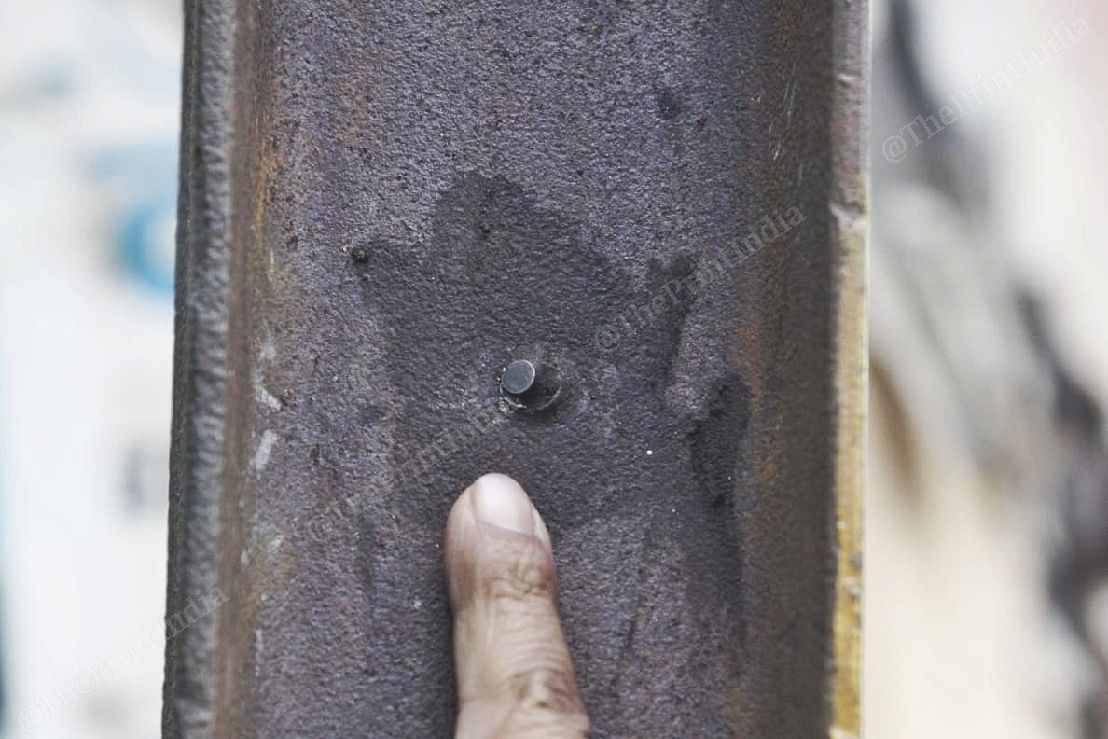 Bullet at the electric poll at Naya Bazar where police firing took place | Photo: Praveen Jain | ThePrint
