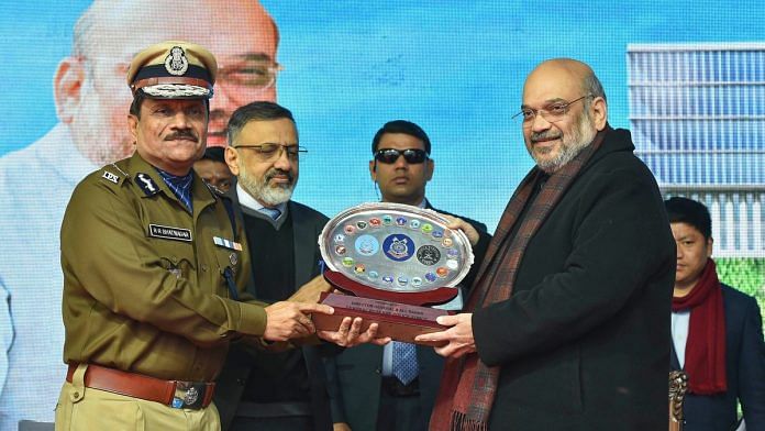 Union Home Minister Amit Shah recieves a memento from DGP CRPF RR Bhatnagar during the foundation laying ceremony of Directorate General building of CRPF in New Delhi | PTI