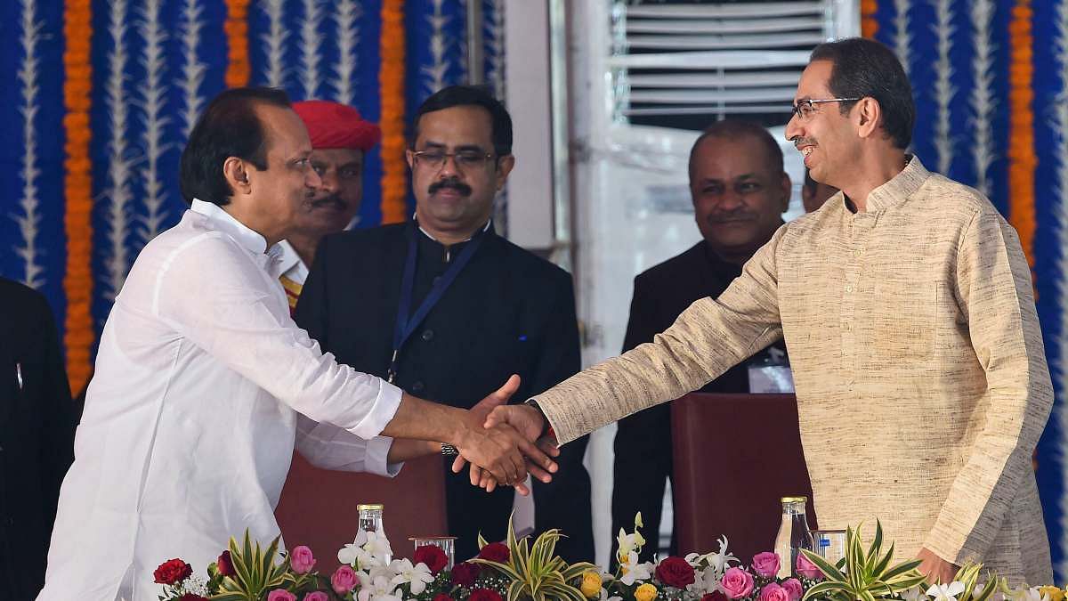Maharashtra's new deputy CM Ajit Pawar with CM Uddhav Thackeray at Monday's swearing-in ceremony | Photo: Mitesh Bhuvad | PTI Maharashtra's new deputy CM Ajit Pawar with CM Uddhav Thackeray at Monday's swearing-in ceremony | Photo: Mitesh Bhuvad | PTI