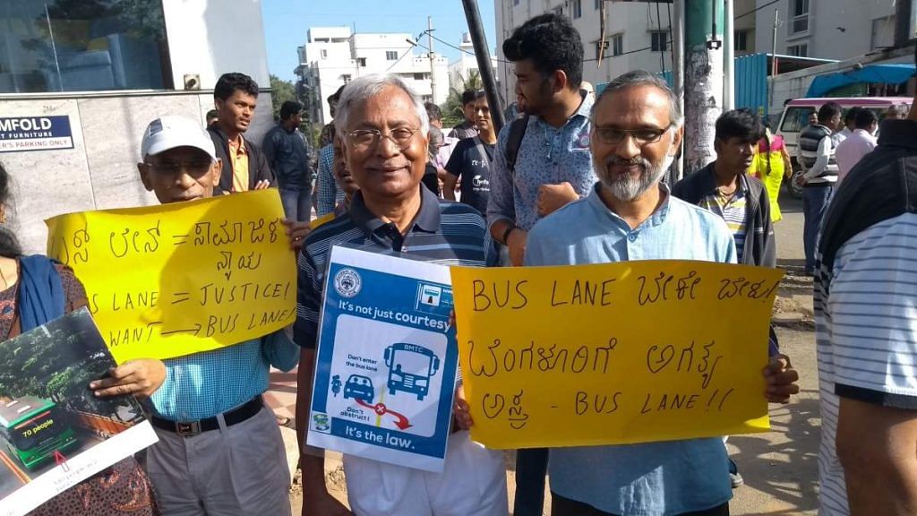 People hold placards protesting against traffic in Bengaluru | Twitter @BBPVedike