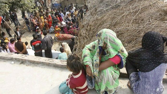 Villagers assemble to pay last their respects to Unnao rape victim on 8 December | Photo: Praveen Jain | ThePrint