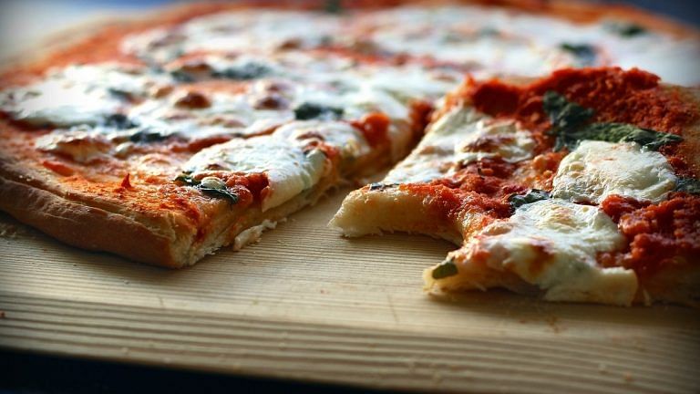We asked 14 men to eat as much pizza as they can to study how bodies cope with excess