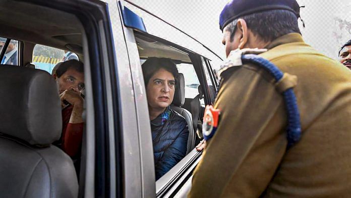 A police officer stops Congress leaders Rahul Gandhi (R) and Priyanka Gandhi Vadra from entering Meerut city, at the border of Meerut, Tuesday, Dec. 24, 2019. | PTI