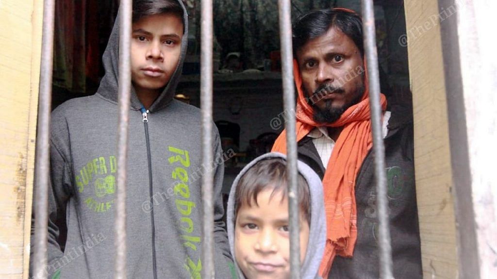 Mohammed Vakil, father of 8-year-old boy Sageer, with his other sons
