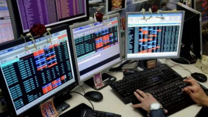 A buyer monitors market fluctuation (Representational Image) | PTI