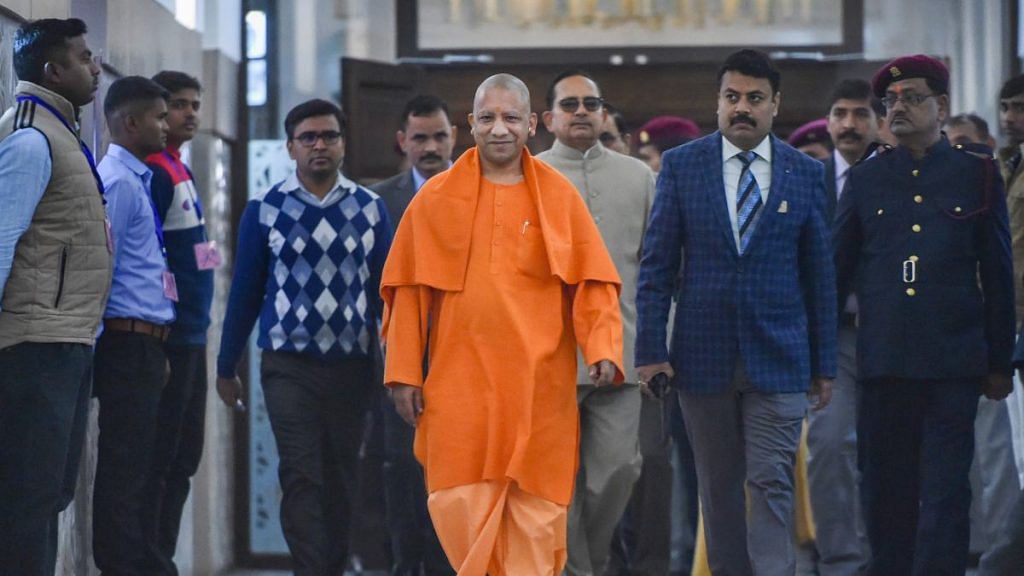 Uttar Pradesh Chief Minister Yogi Adityanath arrives to attend the Winter session of State Assembly in Lucknow | PTI