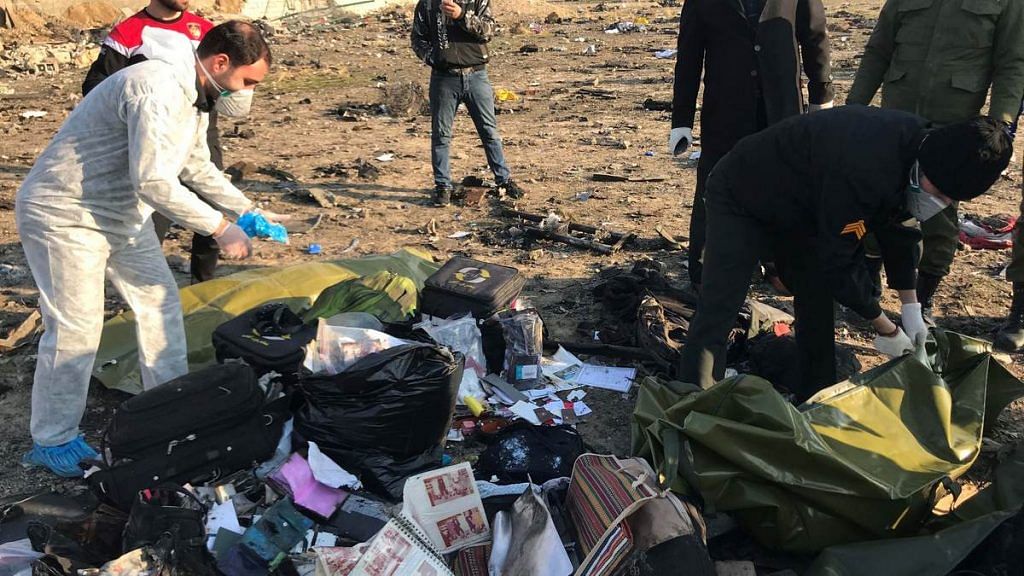 Passengers' belongings are seen after the Ukraine International Airlines plane crashed after take-off from Iran's Imam Khomeini airport