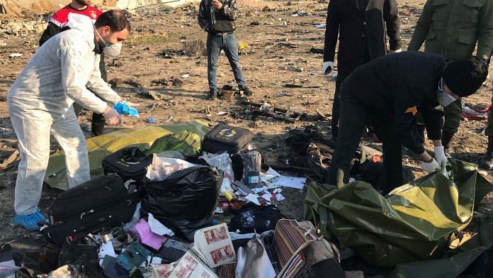 Passengers' belongings are seen after the Ukraine International Airlines plane crashed after take-off from Iran's Imam Khomeini airport