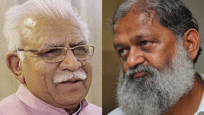 Haryana Chief Minister Manohar Lal Khattar and state Home Minister Anil Vij (R)