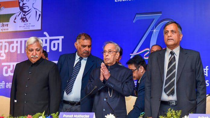 Former president Pranab Mukherjee (C) gestures as Chief Election Commissioner Sunil Arora (L) and Election Commissioner Ashok Lavasa (R) look on, during the first 'Sukumar Sen Memorial Lecture series' | PTI