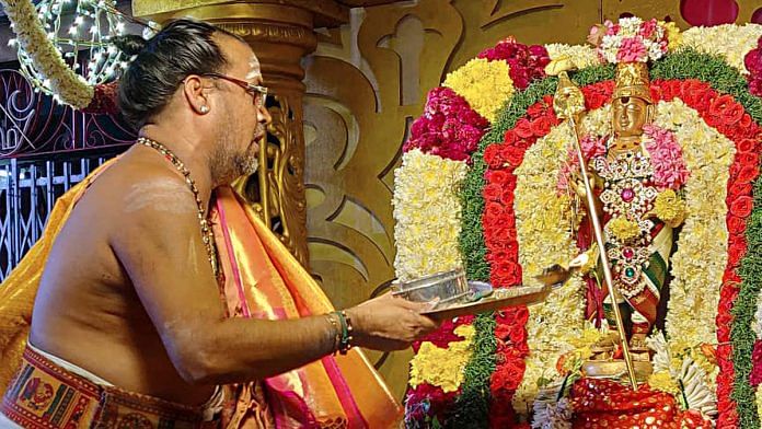 Priests offer prayers to Lord Swaminatha