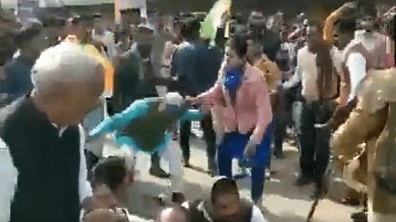Video grab of Rajgarh deputy collector Priya Verma dragging protesters.