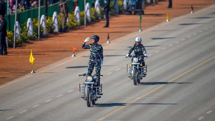An all-woman bikers' team of CRPF showcases daredevil stunts during rehearsal for the Republic Day parade on 23 January