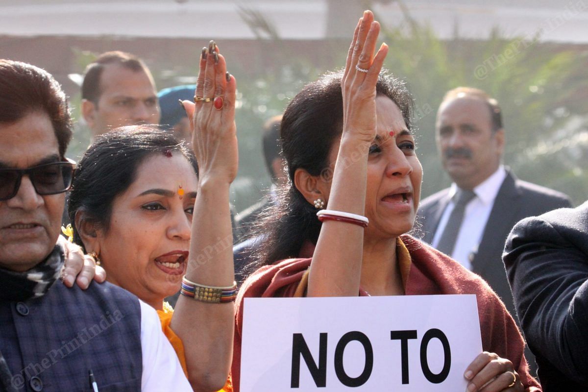 DMK PM Thamizhachi Thangapandian (left) with Supriya Sule (right) at Opposition protest | Photo: Praveen Jain | ThePrint