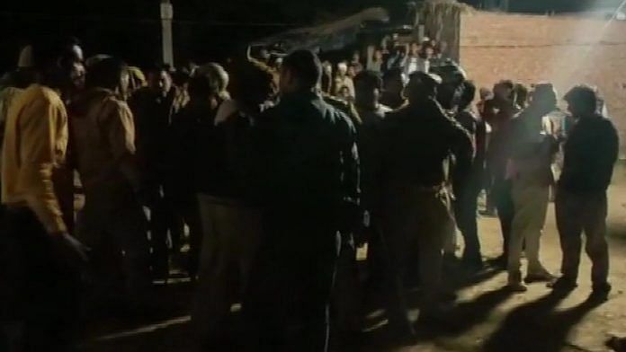 Crowd outside the house where children were held hostage in Farrukhabad