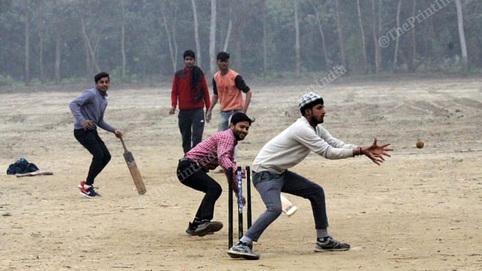 Jobless youth play cricket at Paraspura village on the border of Moradabad and Rampur districts in Uttar Pradesh | Photo: Praveen Jain | ThePrint