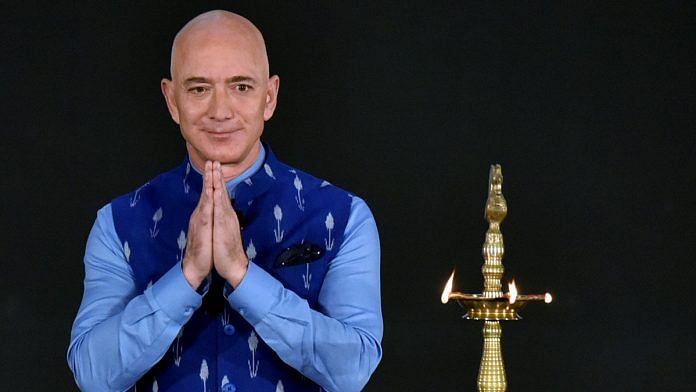 Amazon CEO Jeff Bezos greets during the Amazon SMBhav summit, at Jawahar Lal Nehru Stadium in New Delhi on Wednesday. | ANI