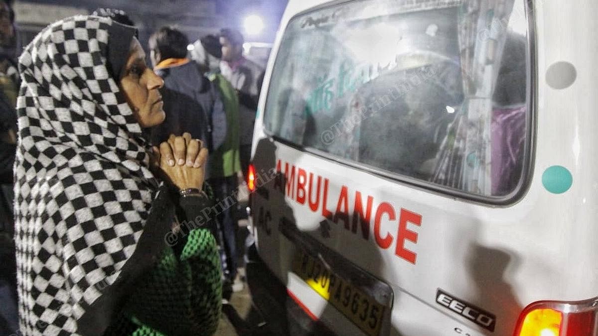 A relative of newborn Asma, praying as an ambulance carrying the baby leaves for Jaipur. | Photo: Praveen Jain/ThePrint 