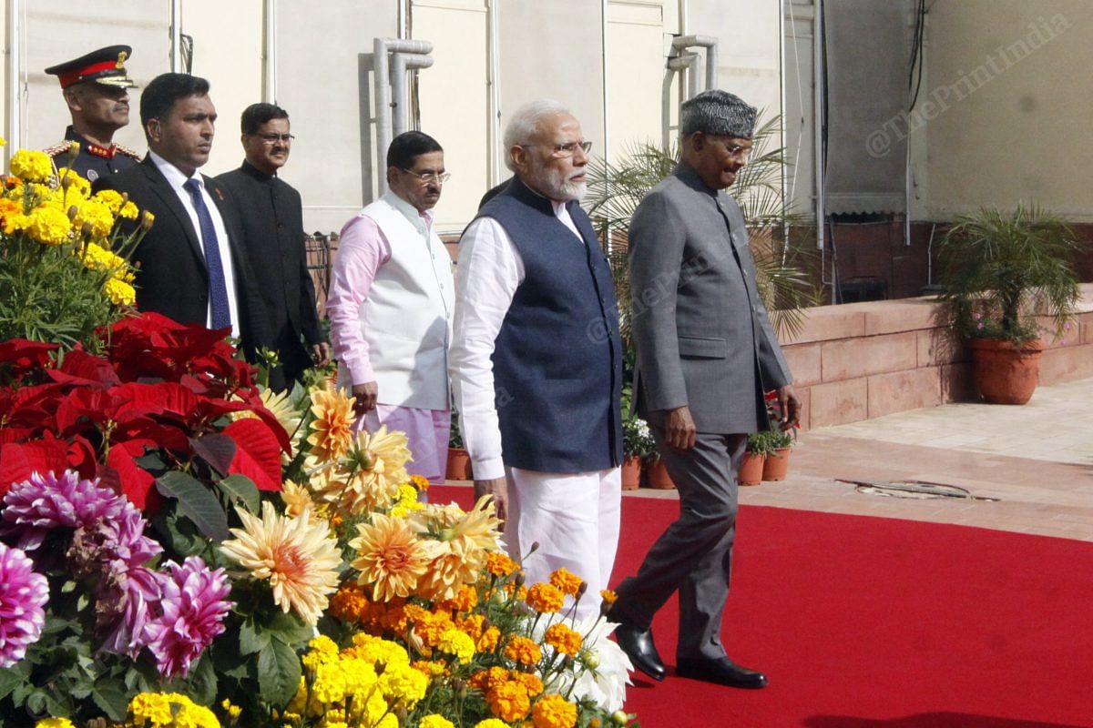 PM Modi and President Ram Nath Kovind walk inside the Parliament | Photo: Praveen Jain | ThePrint