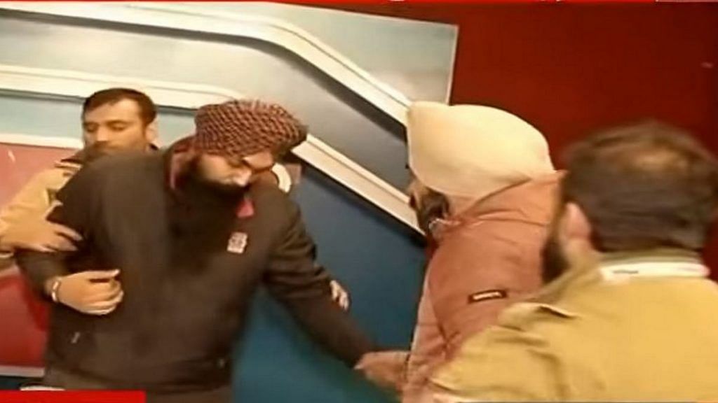 Maninder Singh being arrested on live TV. | YouTube