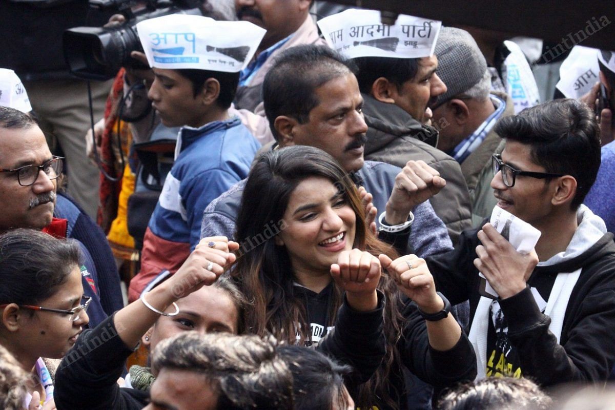 Supporters of AAP at party headquarters | Photo: Praveen Jain | ThePrint