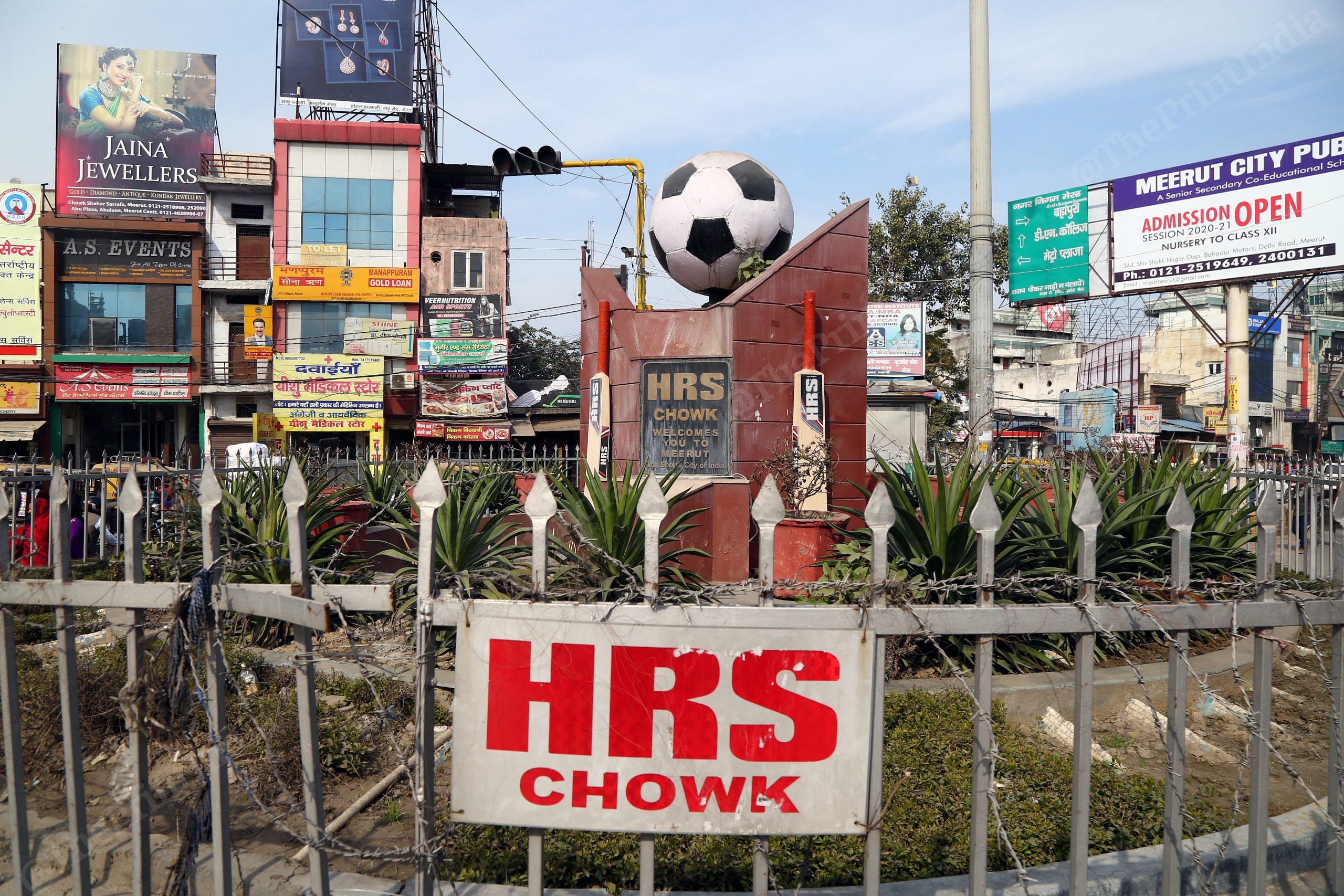 HRS Chowk in Meerut, which is flanked with two bats and a football | Photo: Suraj Singh Bisht | ThePrint