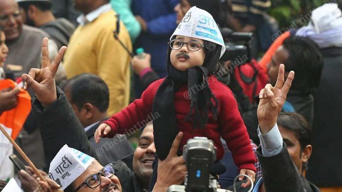 A child dressed as AAP convenor and Delhi CM Arvind Kejriwal at a rally of supporters outside AAP headquarters | Suraj Singh Bisht | ThePrint