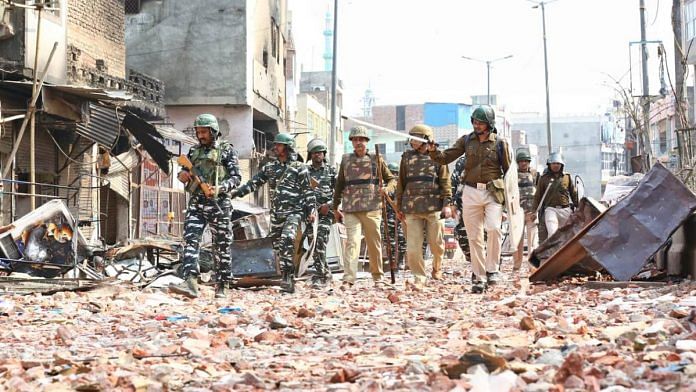 Delhi Police patrol the northeast district where riots broke out in February. At least 53 people had died in the violence | Suraj Singh Bisht | ThePrint