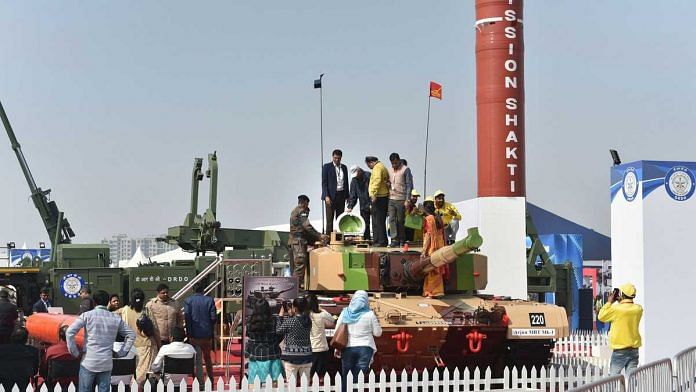 Visitors near the third generation main battle tank Arjun at the 11th edition of DefExpo, in Lucknow Wednesday