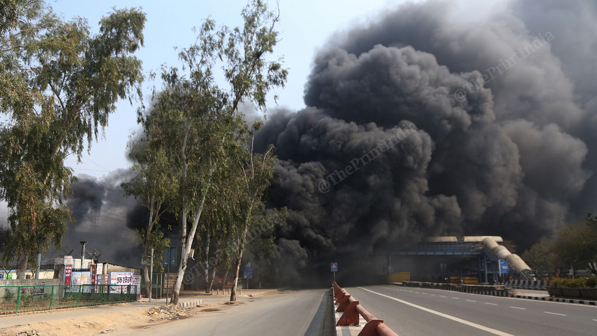 Smoke from the tyre market, which was set on fire once again Tuesday | Photo: Manisha Mondal | ThePrint