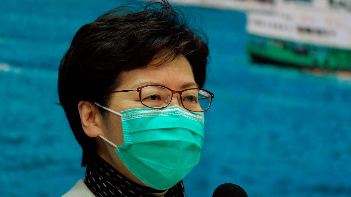 Hong Kong Chief Executive Carrie Lam wears a mask following the outbreak of coronavirus during an news conference, in Hong Kong, China