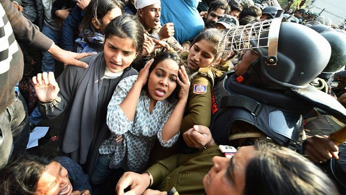 Police try to stop protestors during their march against the amended Citizenship Act, NRC and NPR, near Jamia Nagar in New Delhi on Monday, 10 Feb, 2020. | Photo: Arun Sharma | PTI