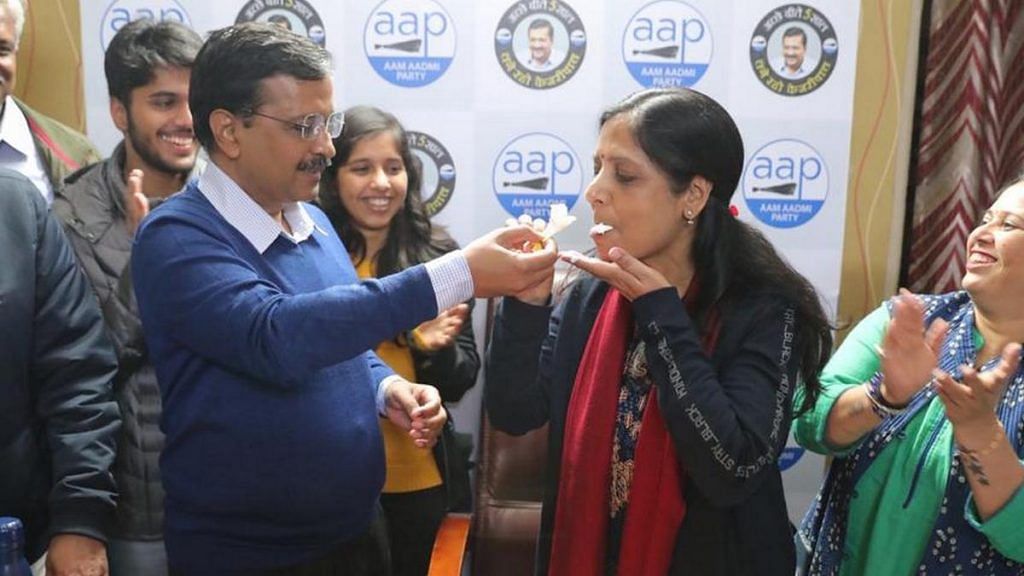AAP chief Arvind Kejriwal and his wife Sunita at the party headquarters in New Delhi. | Photo: By special arrangement