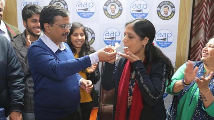 AAP chief Arvind Kejriwal and his wife Sunita at the party headquarters in New Delhi. | Photo: By special arrangement